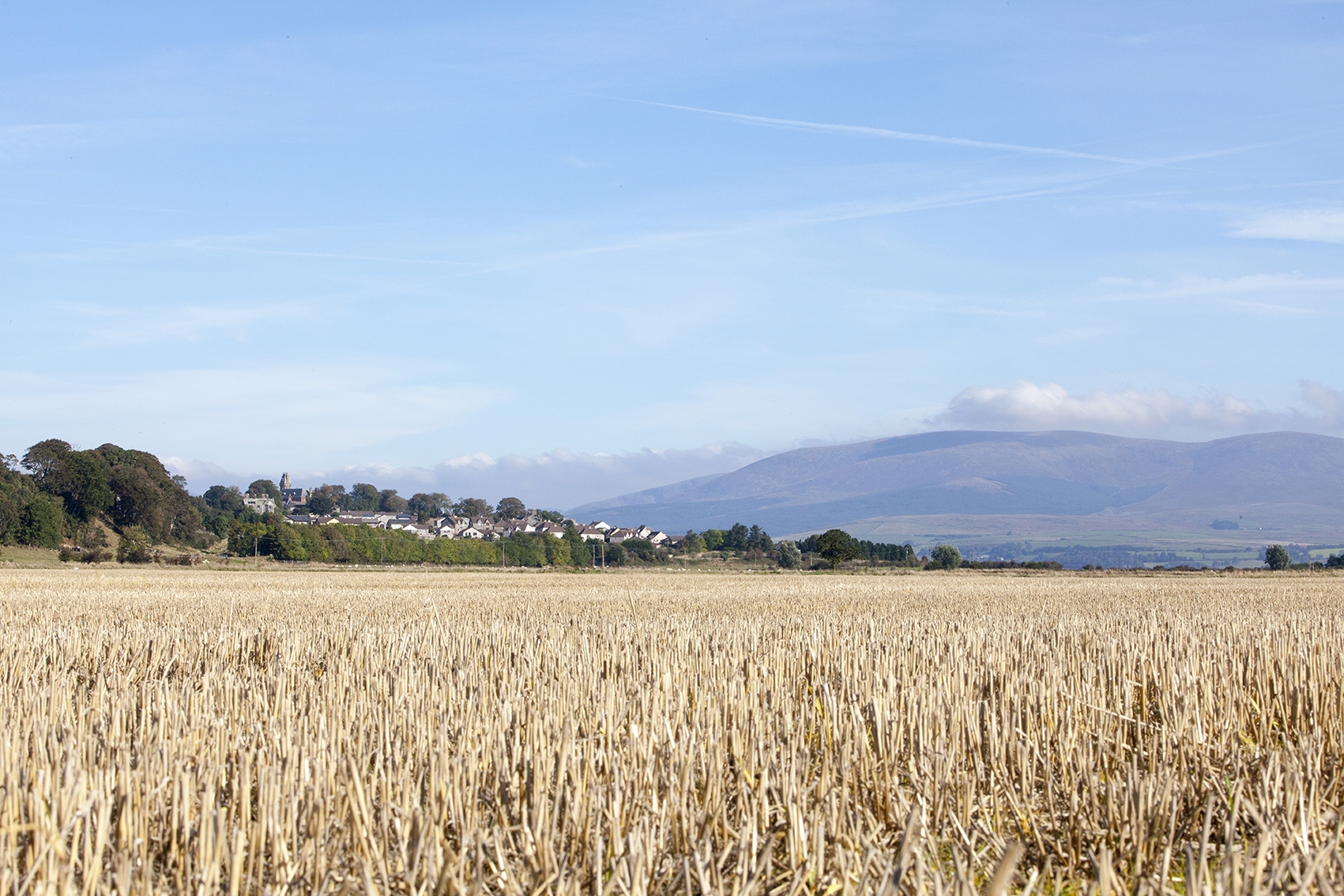 A distant view of Wigtown, Scotland's National Book Town. The Galloway hills in the distance.