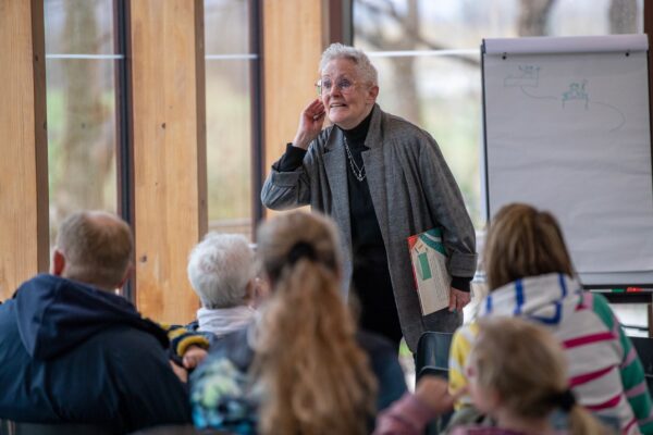 Author Vivien french animatedly speaking to an audience of children at Big DoG 2022