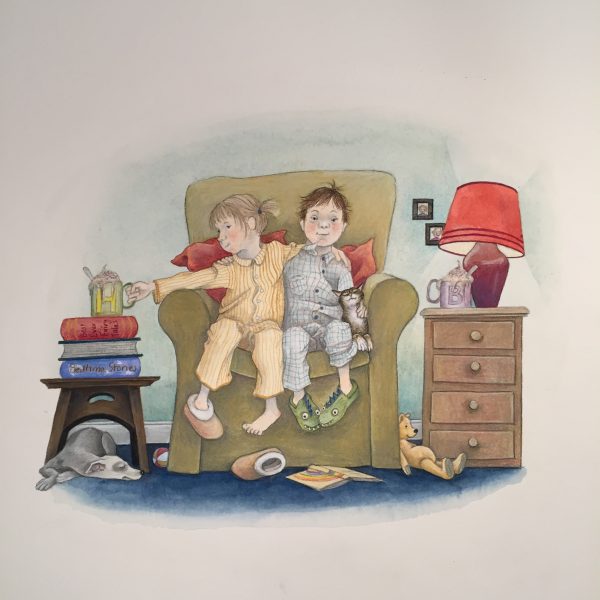 A Sensory Story' book by Allie Finlay and Kate Leaper. Two children are sitting in an armchair with a cat. One child holds a cup of hot chocolate perched upon a stack of books resting on a small table, a dog lies sleeping underneath. Books, a slipper and a teddy bear are scattered on the floor. A lamp and another mug of hot chocolate are placed upon a small set of drawers.