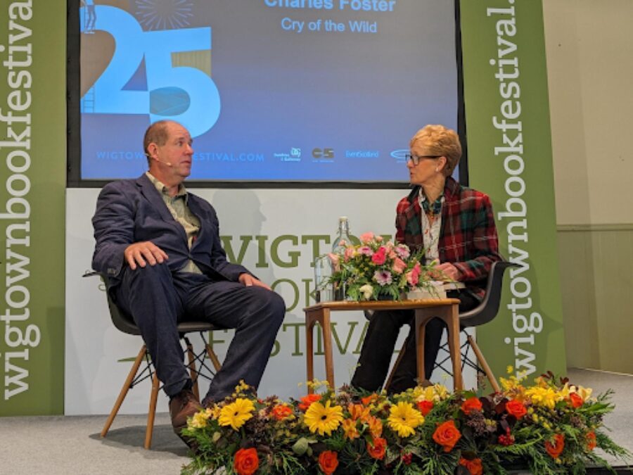Polly Pullar and Charles Foster in conversation on stage at Wigtown Book Festival 2023